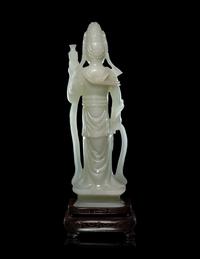 A Pale Celadon Jade Figure of Standing Guanyin