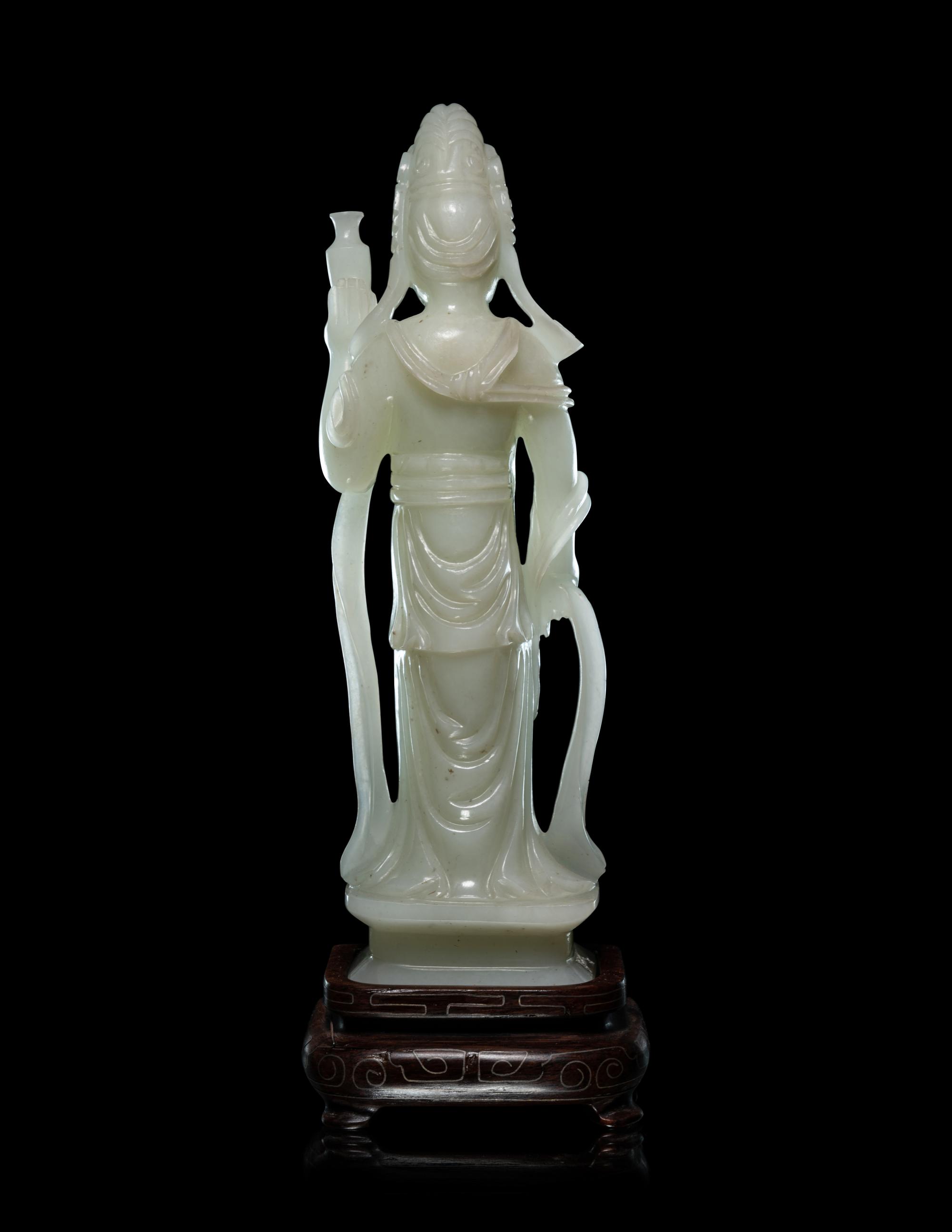A Pale Celadon Jade Figure of Standing Guanyin