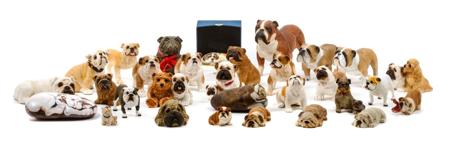 A Group of Thirty-One Bulldog Figures Width of widest 8 1/2 inches.