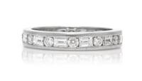 A Platinum and Diamond Eternity Band, Tiffany & Co., 3.30 dwts.