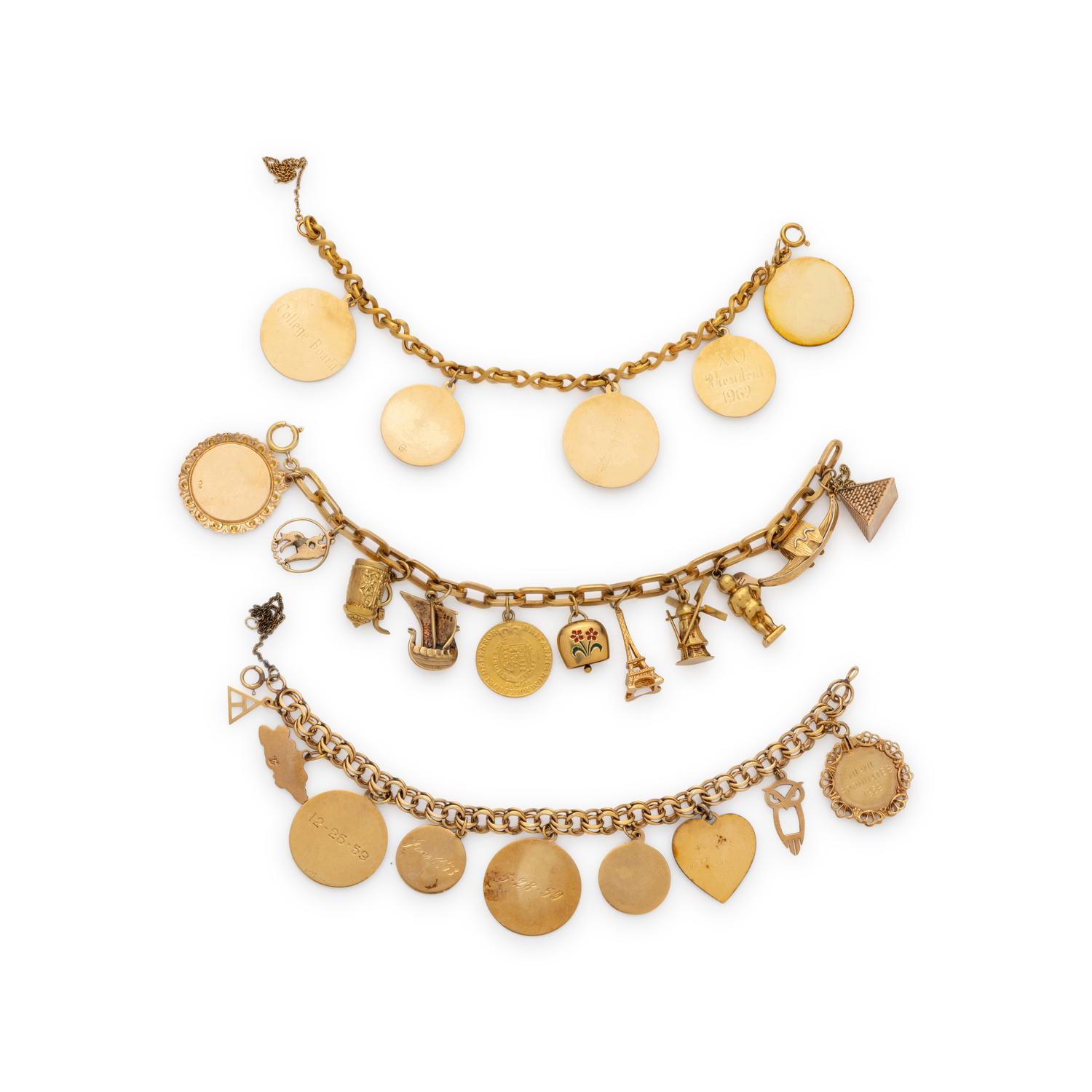 COLLECTION OF YELLOW GOLD CHARM BRACELETS