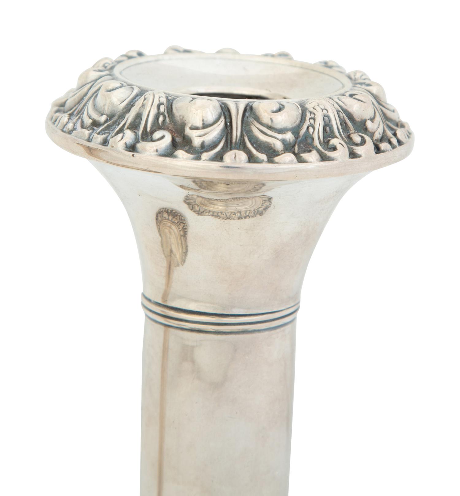 A Pair of English Weighted Silver Candlesticks