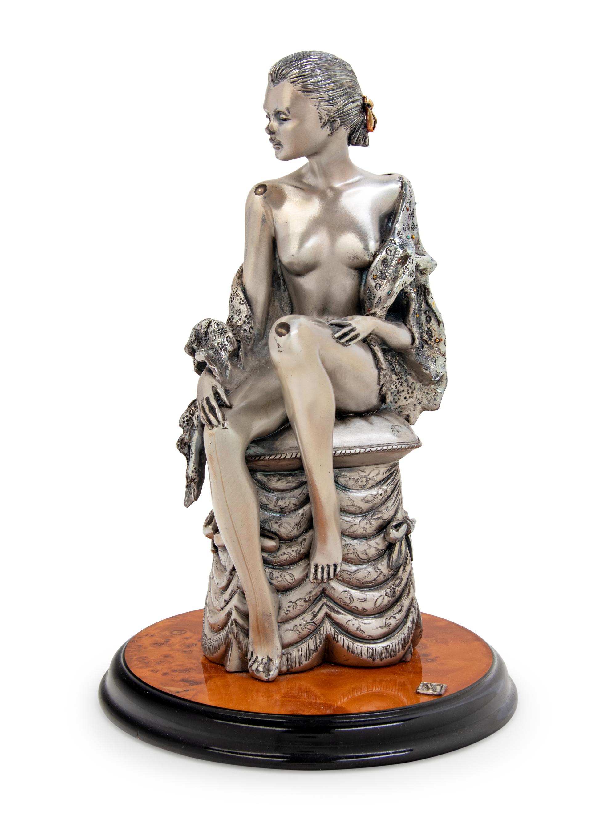 An Italian Silver Figure of a Lady