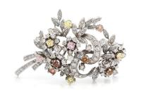 An 18 Karat White Gold, Colored Diamond and Diamond Floral Spray Brooch, 14.70 dwts.