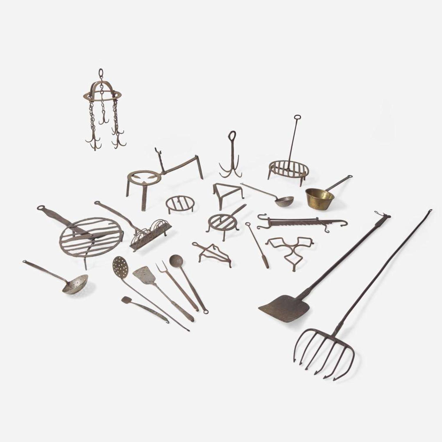 A large collection of twenty-three wrought iron cooking utensils 18th / 19th century