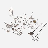 A large collection of twenty-three wrought iron cooking utensils 18th / 19th century