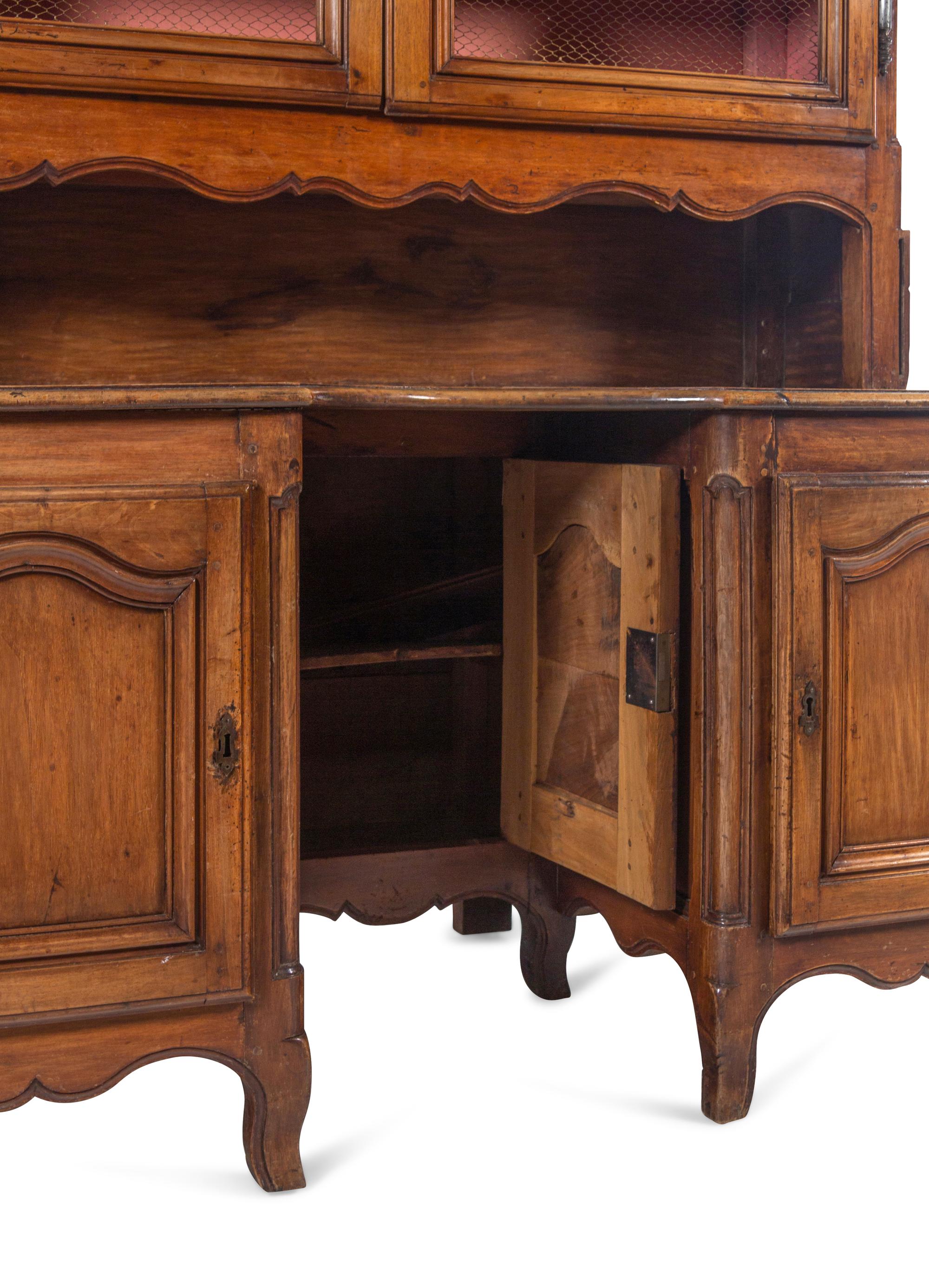A Louis XV Provincial Style Walnut Bureau Bookcase