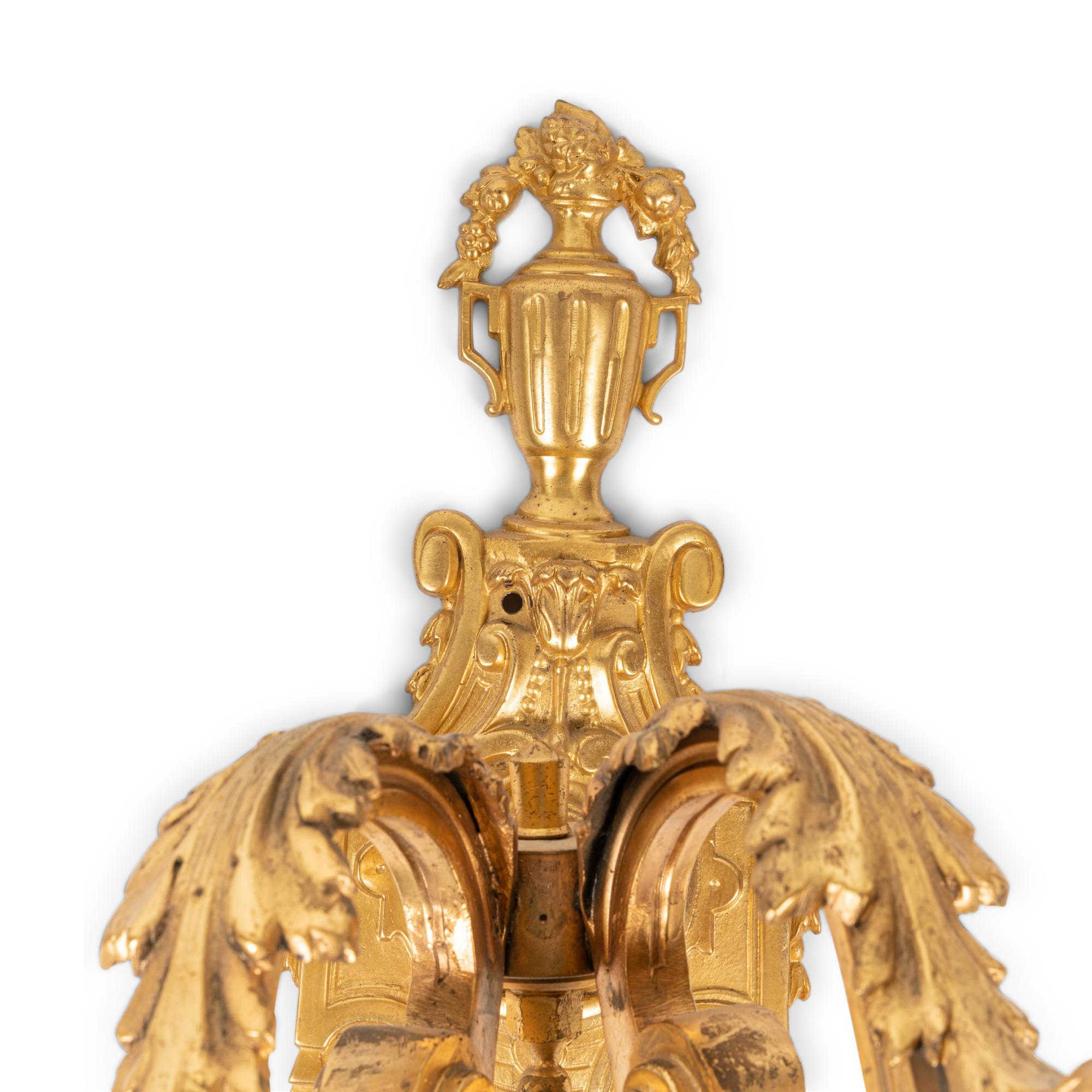 A Pair of Louis XVI Style Gilt Bronze Two-Light Sconces