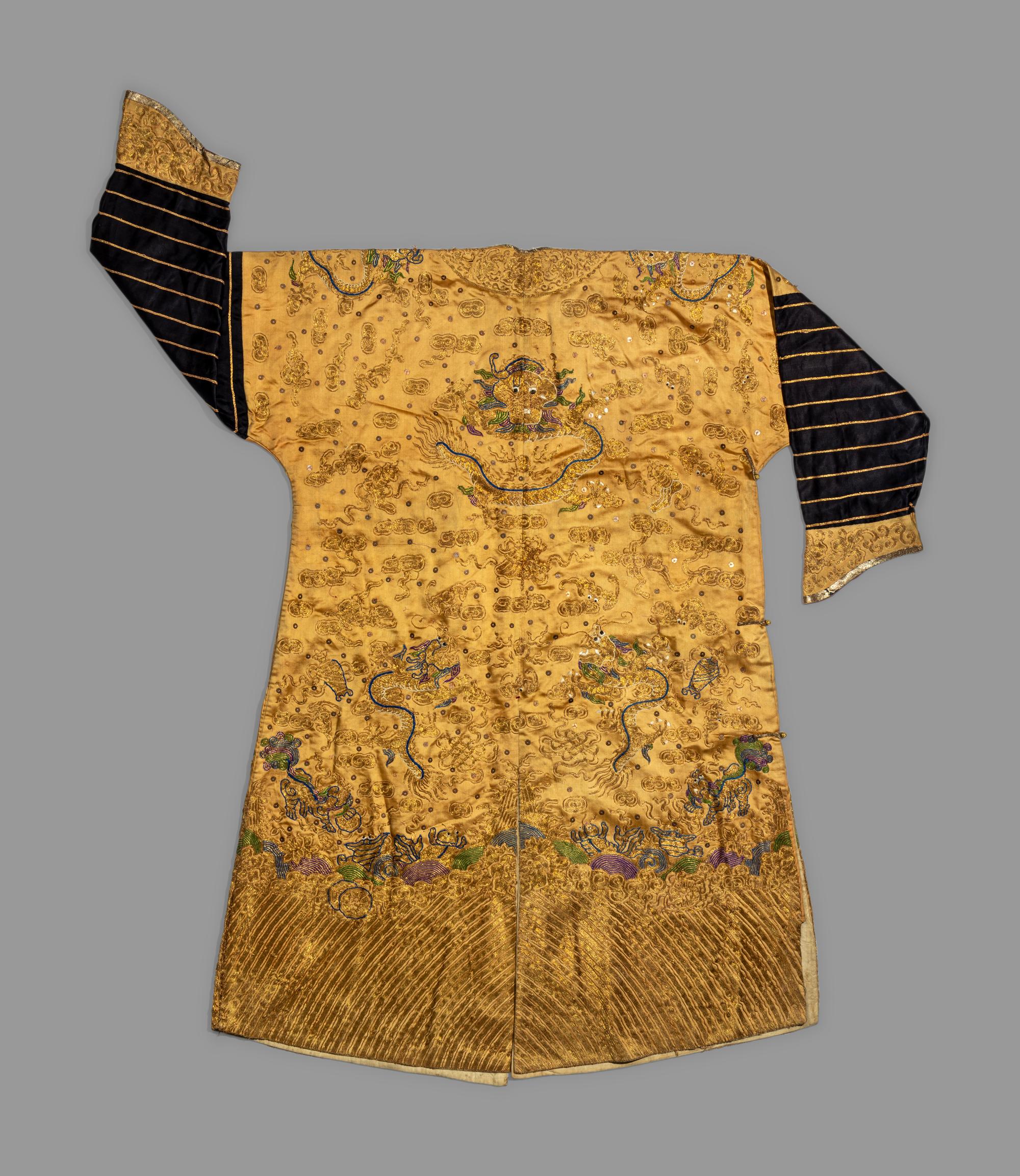 A Chinese Yellow Ground Embroidered Silk Dragon Robe