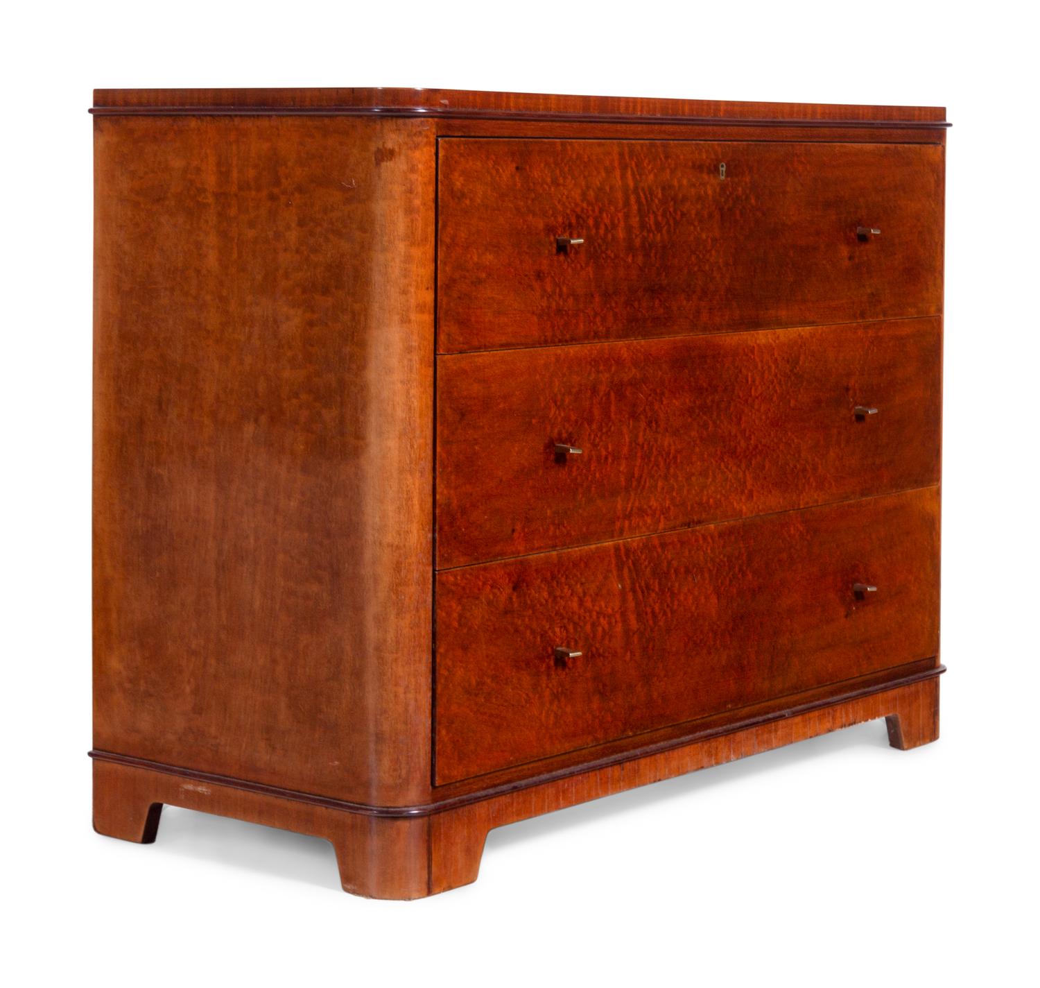 A Pair of Continental Thuya or Yew Wood Chests of Drawers