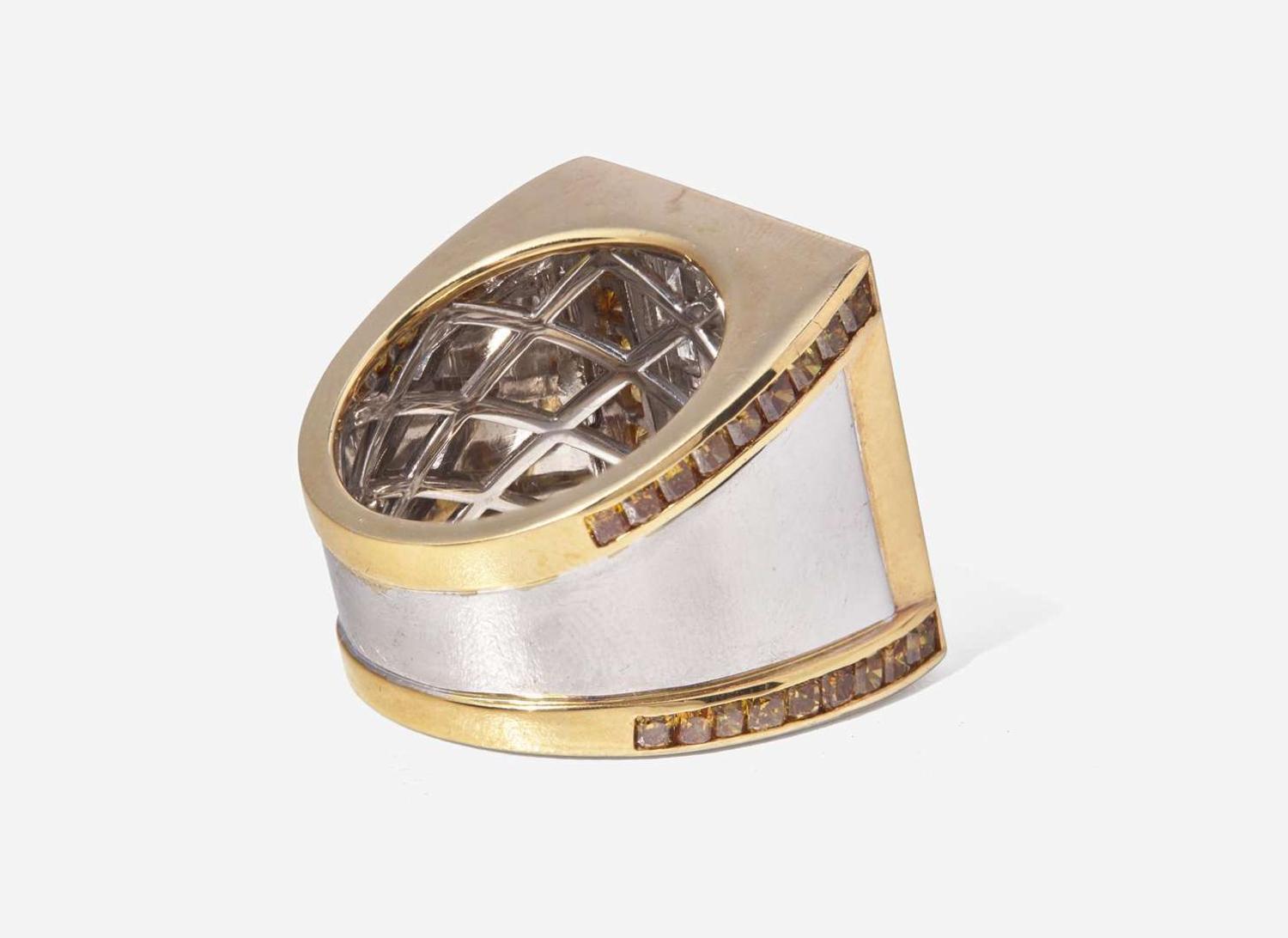 An 18K White and Yellow Gold Ring with Fancy Dark Brown-Purple, Yellow, Brown, and White Diamonds, 1.09 Carat Fancy Dark Brown-Purple Diamond GIA Certified