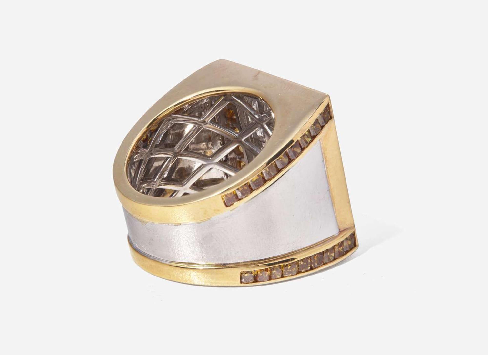 An 18K White and Yellow Gold Ring with Fancy Dark Brown-Purple, Yellow, Brown, and White Diamonds, 1.09 Carat Fancy Dark Brown-Purple Diamond GIA Certified