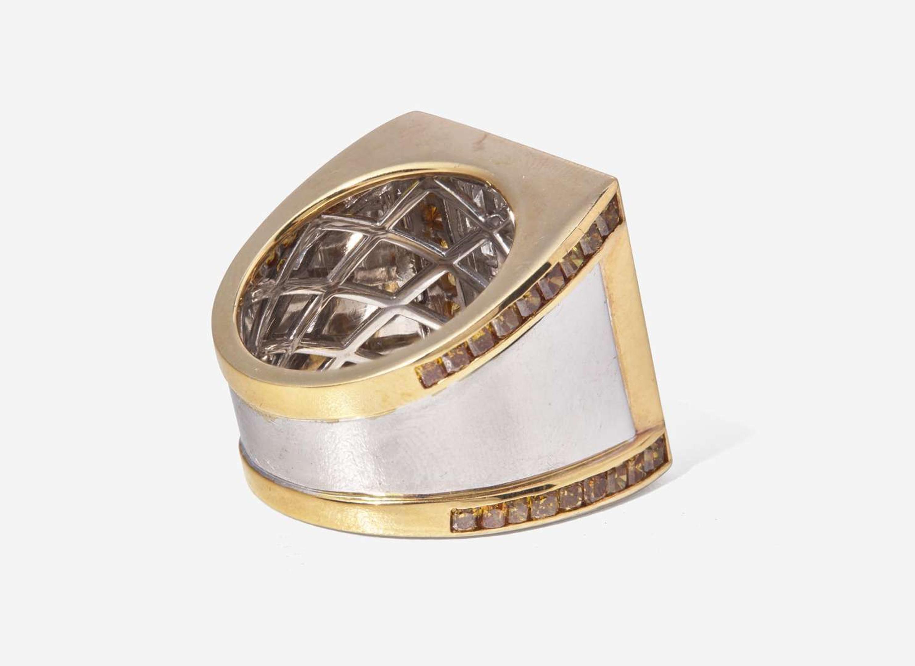 An 18K White and Yellow Gold Ring with Fancy Dark Brown-Purple, Yellow, Brown, and White Diamonds, 1.09 Carat Fancy Dark Brown-Purple Diamond GIA Certified