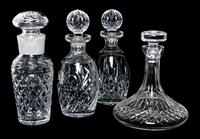 Four Waterford Glass Decanters, Height of tallest 10 1/2 inches.