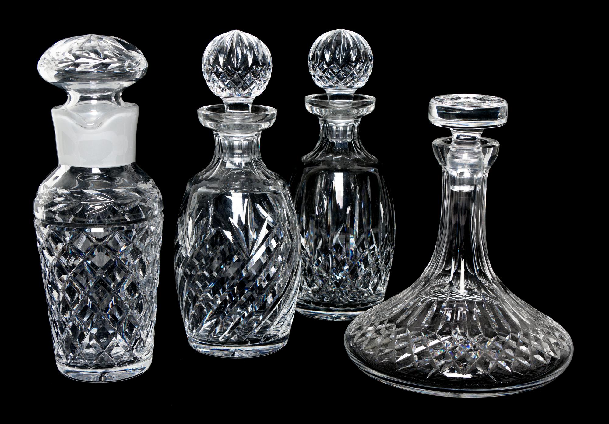 Four Waterford Glass Decanters, Height of tallest 10 1/2 inches.