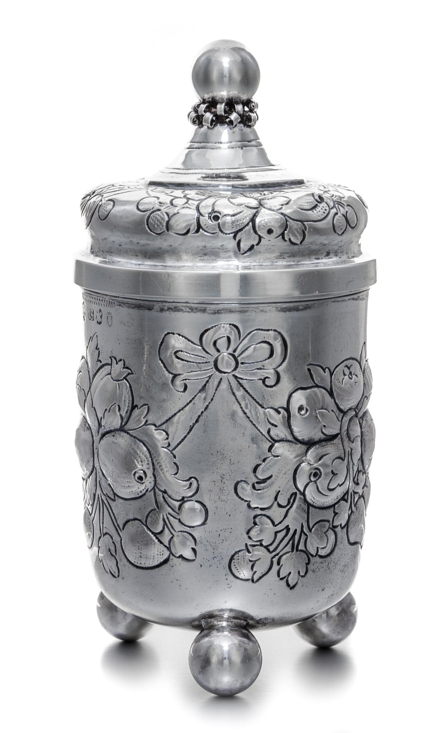 A German Silver Covered Jar, B. Neresheimer & Sohne, Hanau, 19th/20th Century, of cylindrical form, having foliate and berry decoration