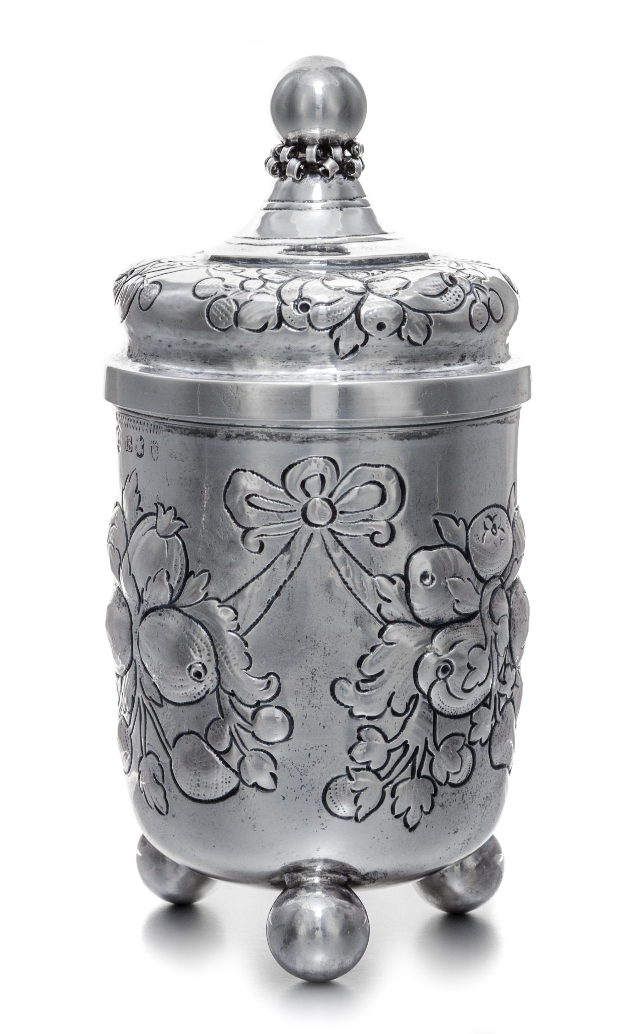A German Silver Covered Jar, B. Neresheimer & Sohne, Hanau, 19th/20th Century, of cylindrical form, having foliate and berry decoration