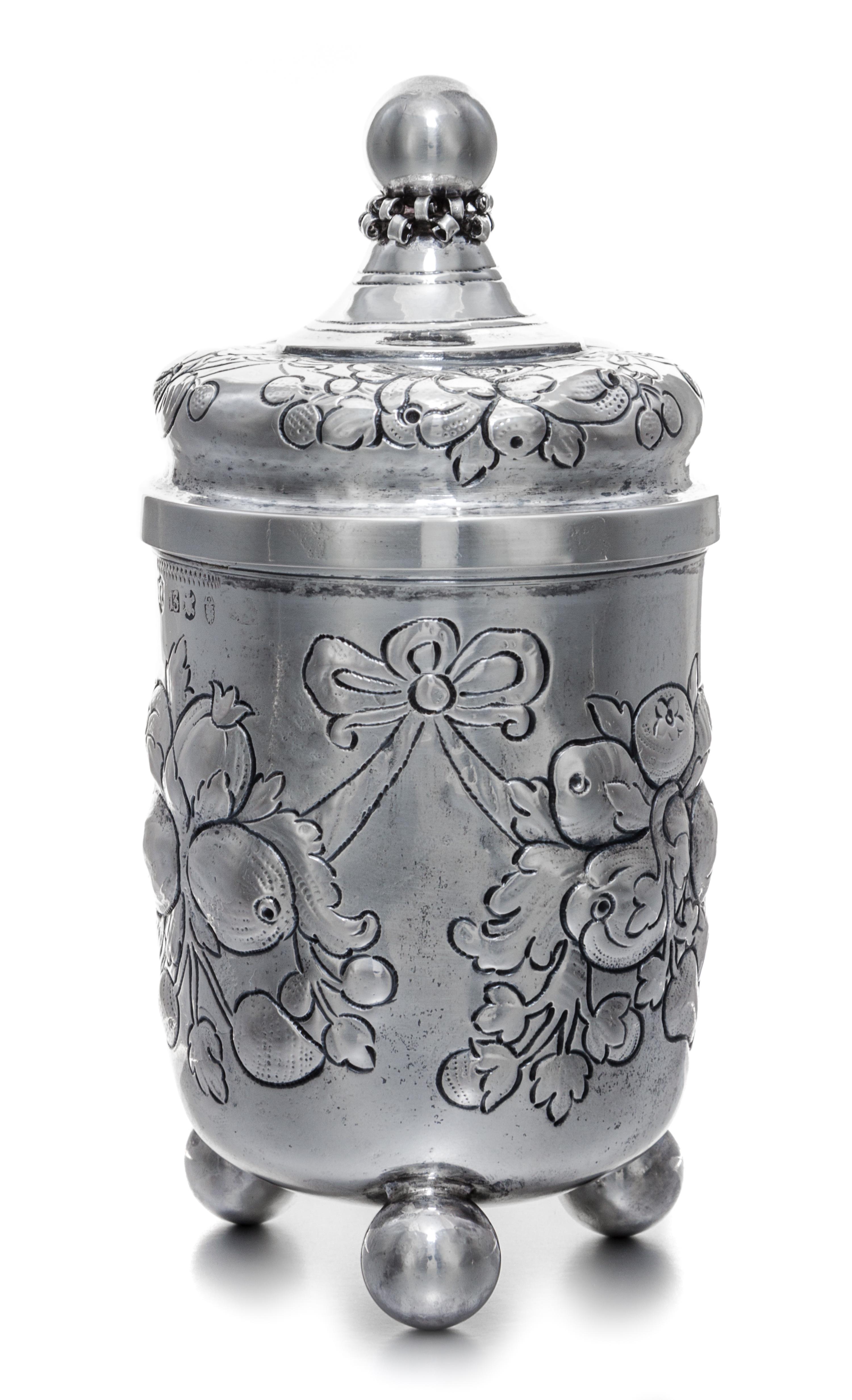 A German Silver Covered Jar, B. Neresheimer & Sohne, Hanau, 19th/20th Century, of cylindrical form, having foliate and berry decoration