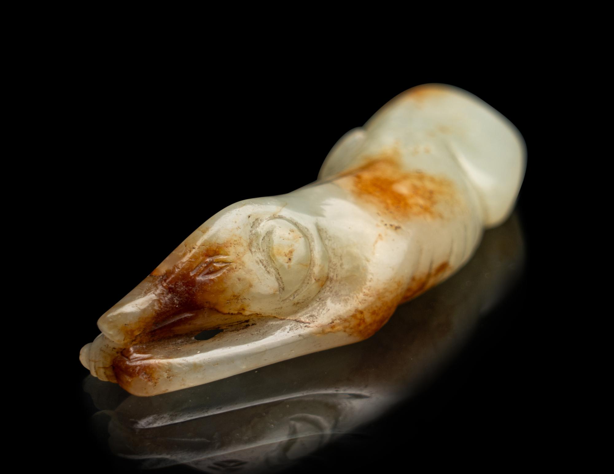 A Chinese Russet and Pale Celadon Green Jade Figure of a Hound