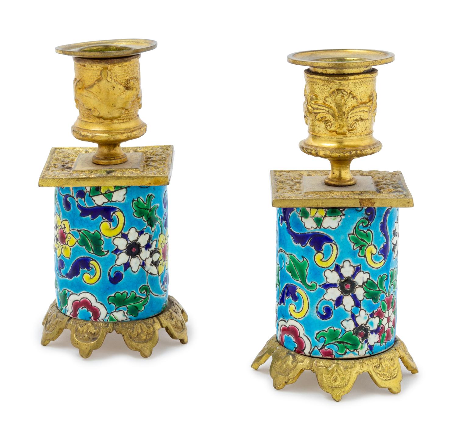 A Pair of Longwy Gilt Metal Mounted Ceramic Candlesticks