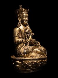 A Tibetan Gilt Bronze Figure of a Seated Karmapa