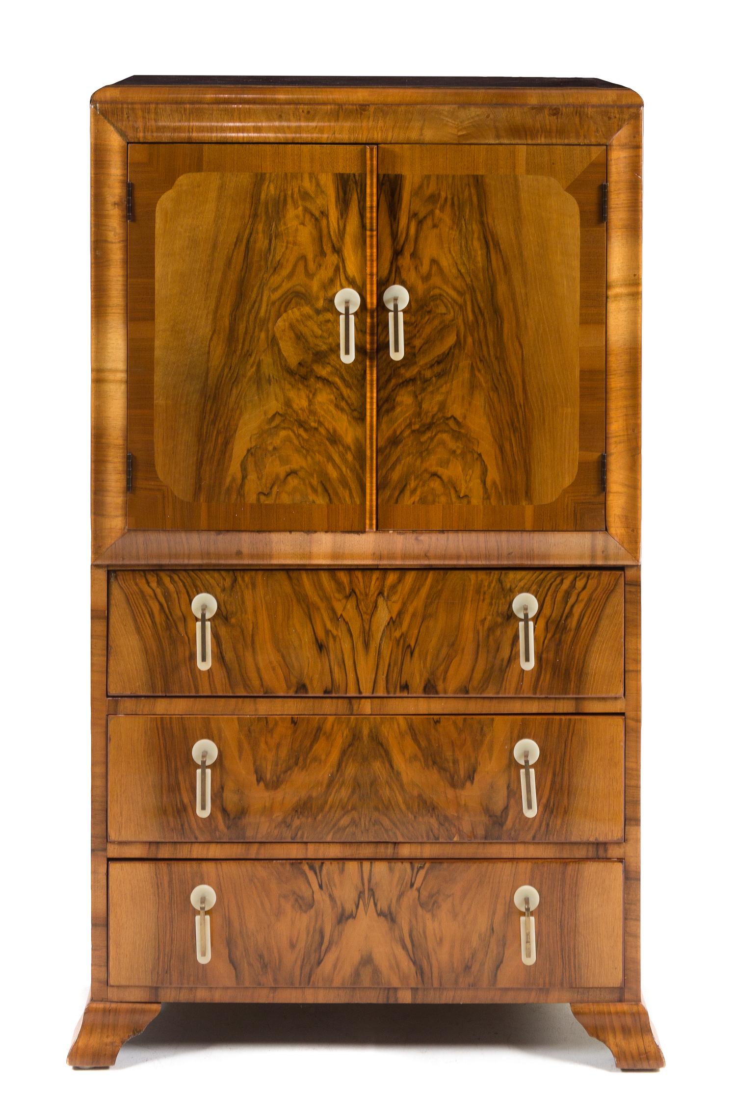 Art Deco, c.1930, a bedroom suite, comprising an armoire, cabinet and vanity/desk