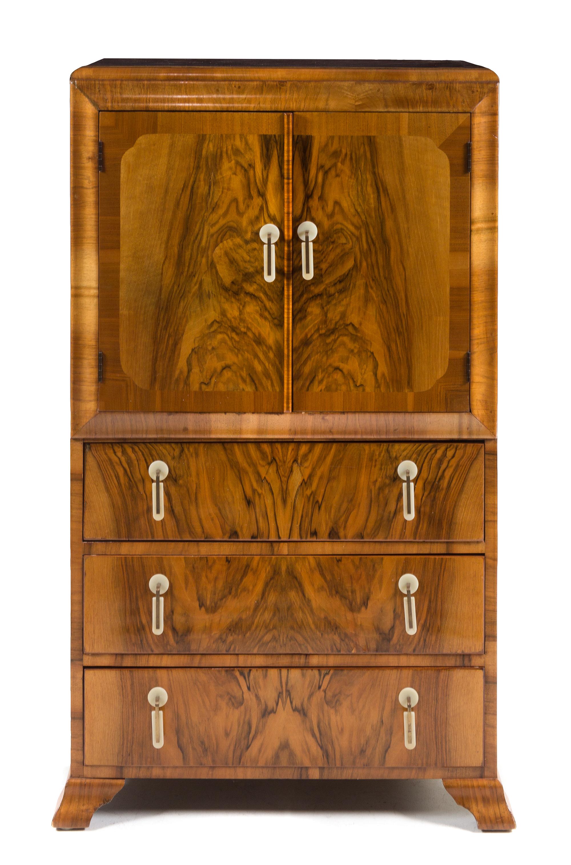 Art Deco, c.1930, a bedroom suite, comprising an armoire, cabinet and vanity/desk