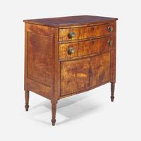 A Federal carved tiger maple bowfront dressing table together with tiger maple mirror early 19th century