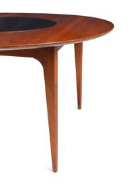 A Modernist Walnut Round Table
