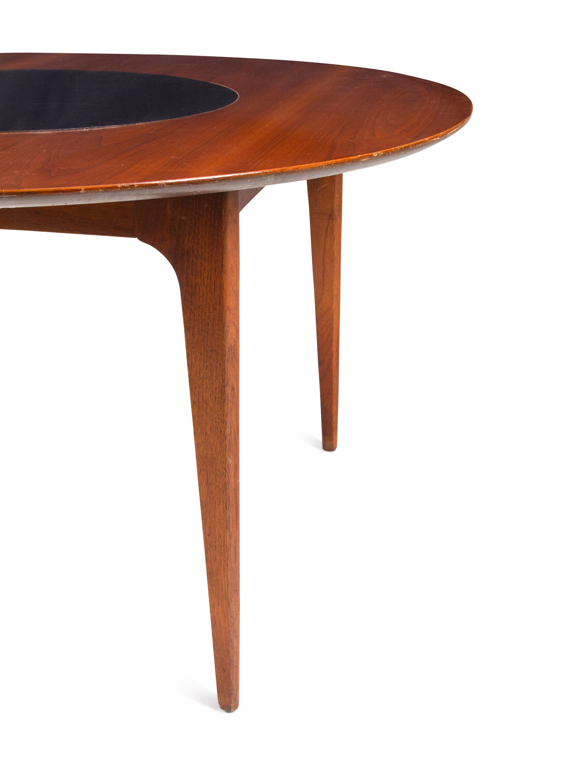 A Modernist Walnut Round Table