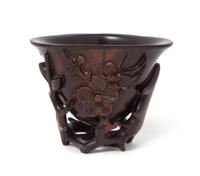 A Chinese Carved Wood Libation Cup Height 3 inches.