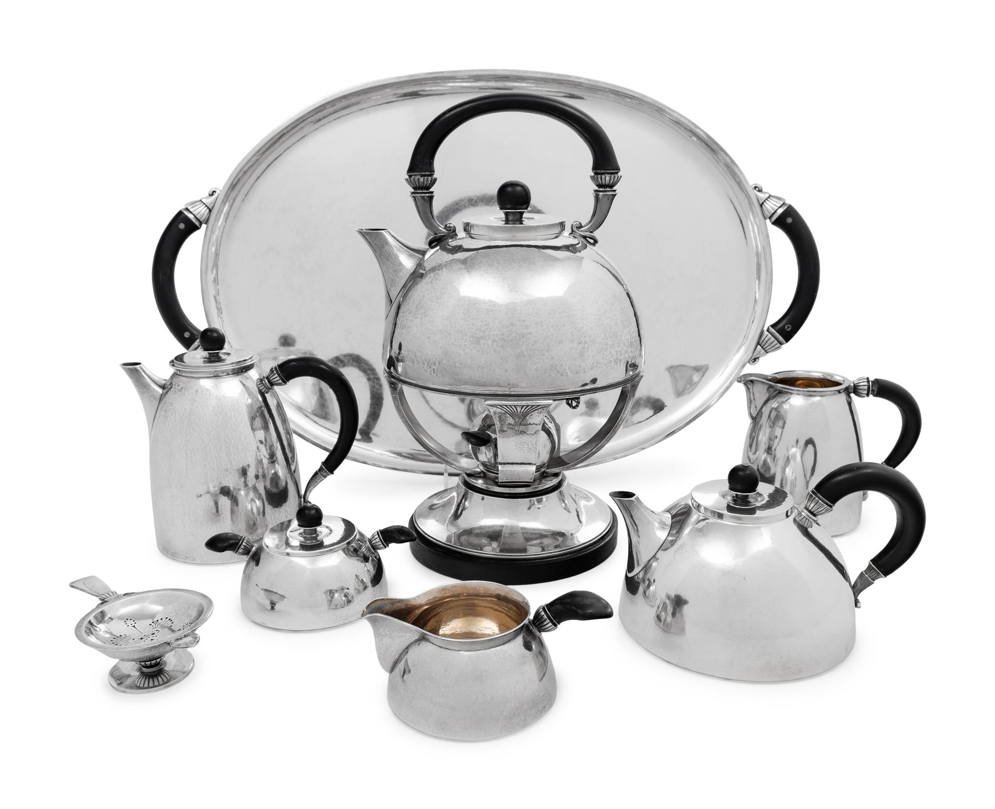 A Gundorph Albertus Designed Georg Jensen Silver Eight-Piece Tea and Coffee Service