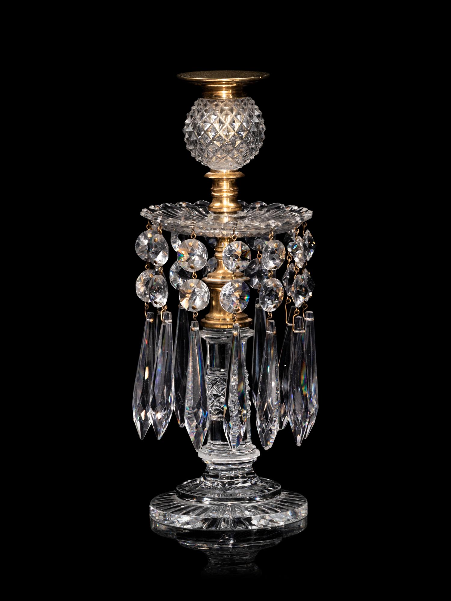 A Set of Four Regency Brass-Mounted Cut Glass Candlesticks