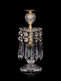 A Set of Four Regency Brass-Mounted Cut Glass Candlesticks