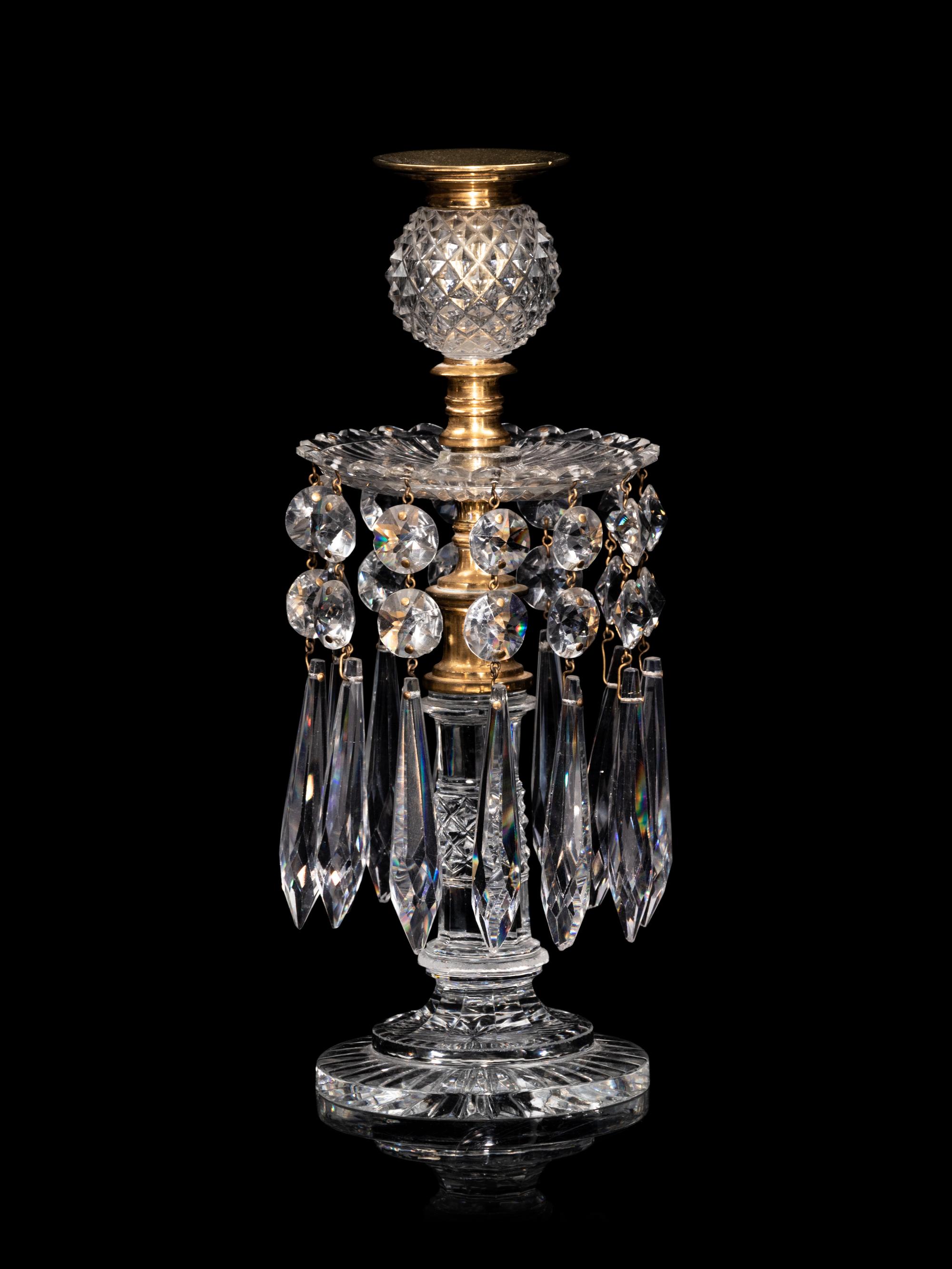A Set of Four Regency Brass-Mounted Cut Glass Candlesticks