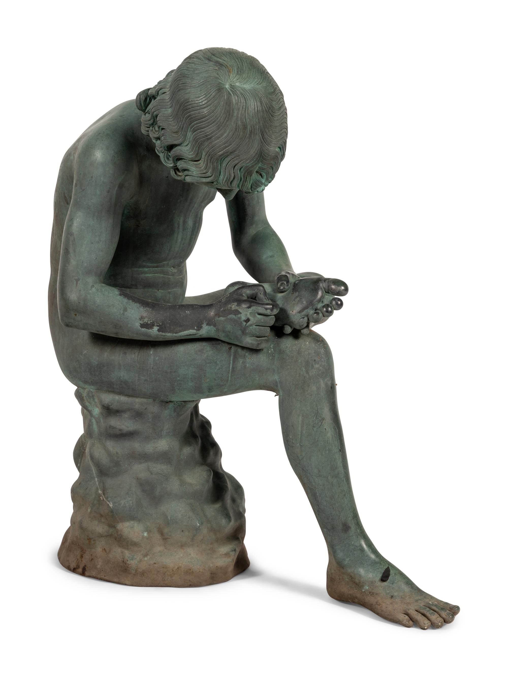 A Patinated Bronze Figure of the Spinario