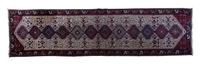 A Yalamah Wool Runner, 16 feet x 3 feet 5 inches.