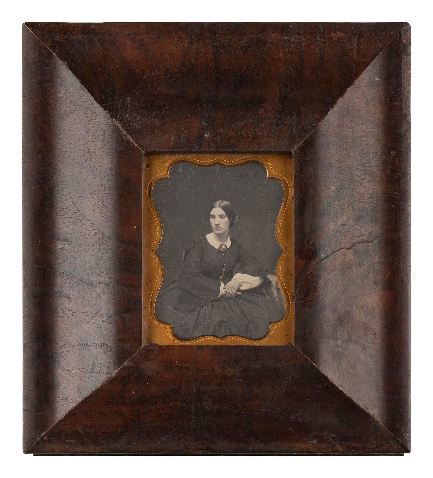 [EARLY PHOTOGRAPHY]. 13 daguerreotypes and one ambrotype of lovely young ladies.
