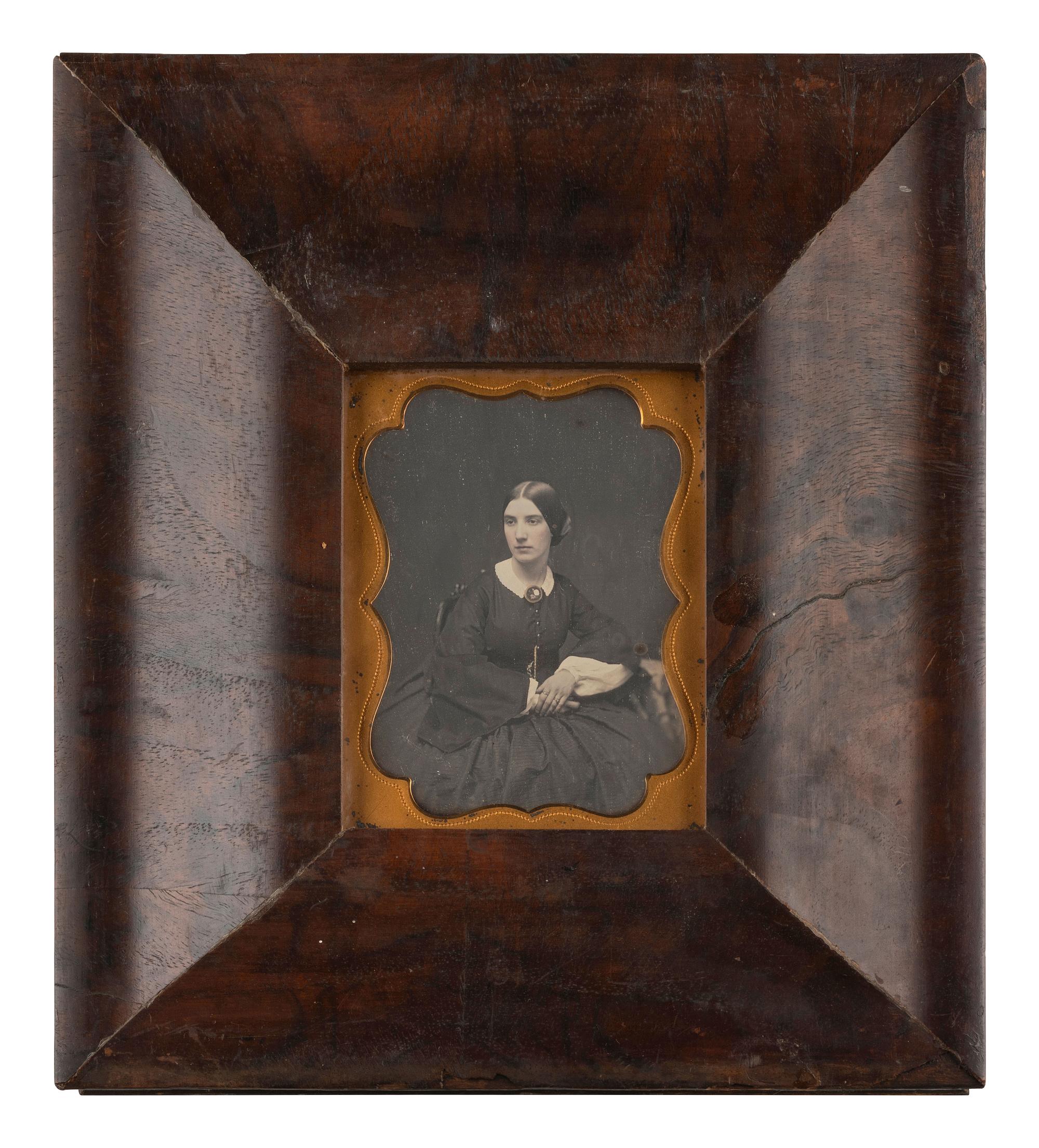 [EARLY PHOTOGRAPHY]. 13 daguerreotypes and one ambrotype of lovely young ladies.