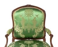 A Pair of Louis XV Beechwood Fauteuils