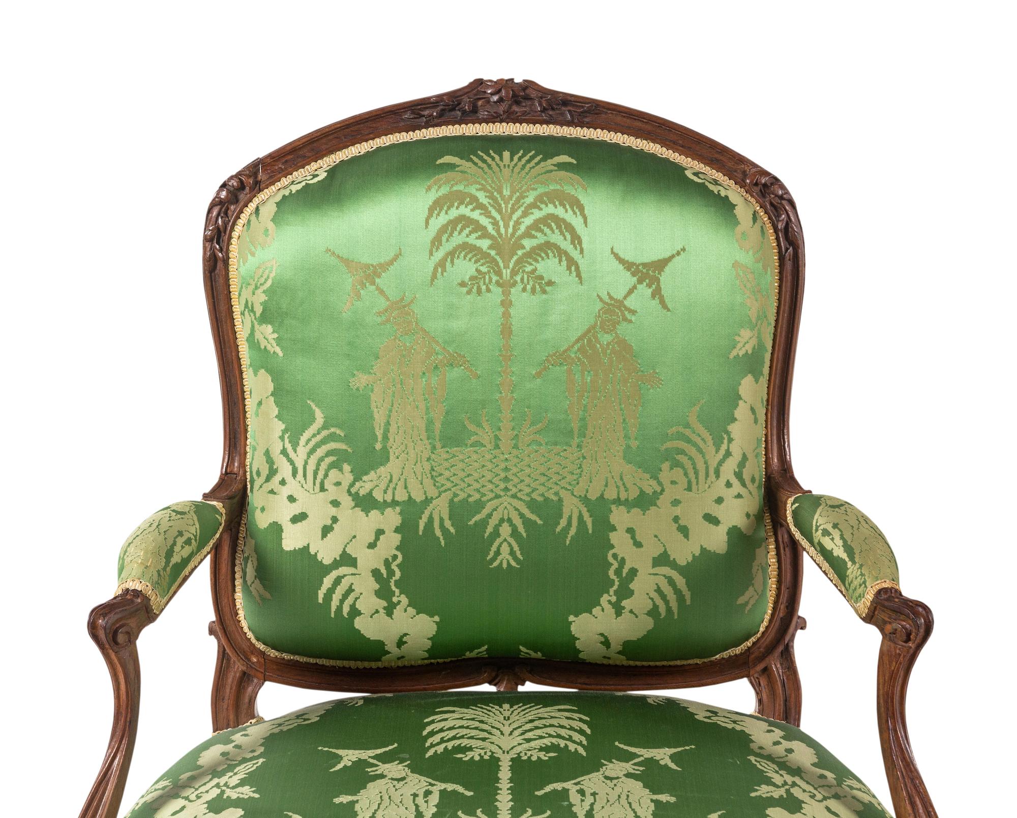 A Pair of Louis XV Beechwood Fauteuils