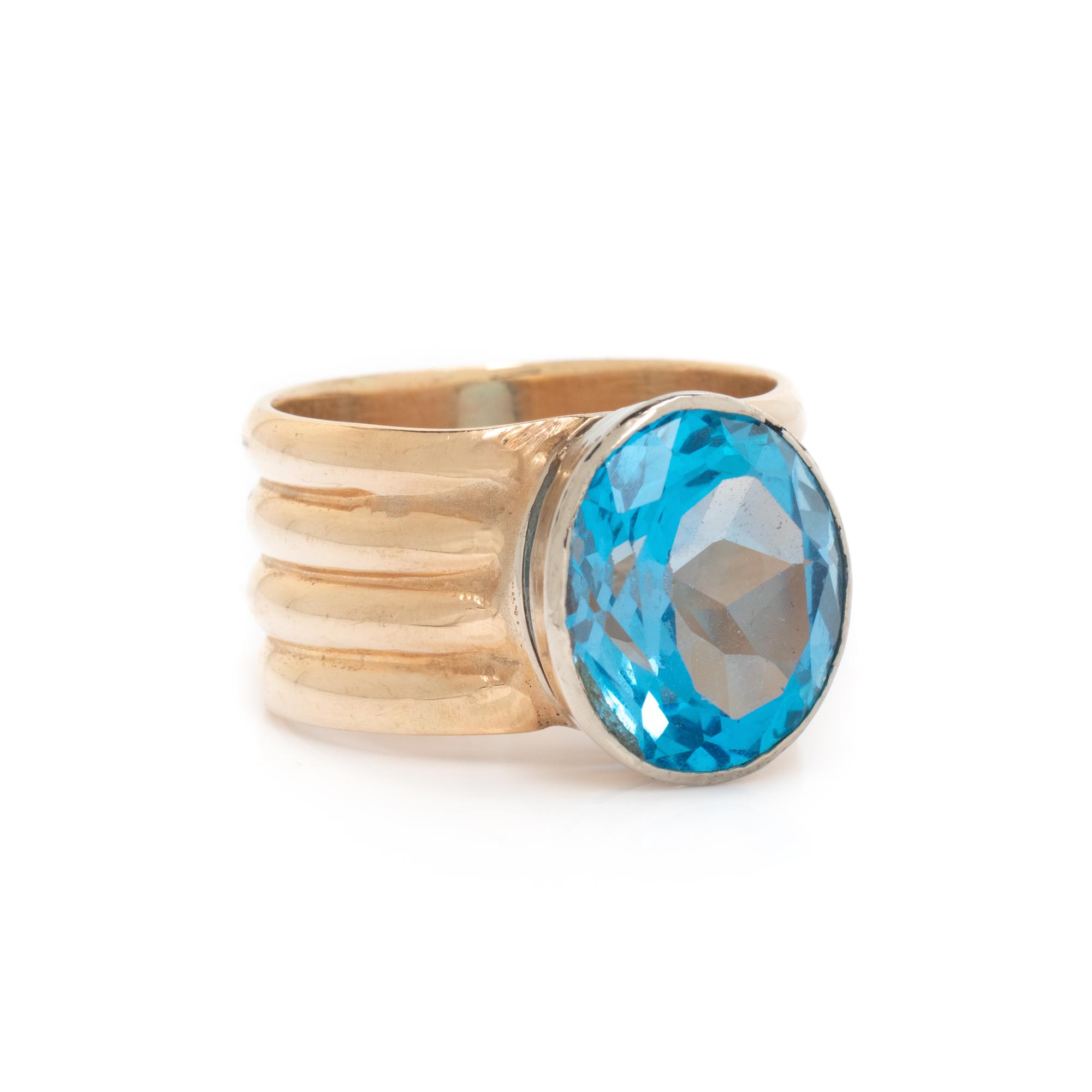 YELLOW GOLD AND BLUE TOPAZ RING