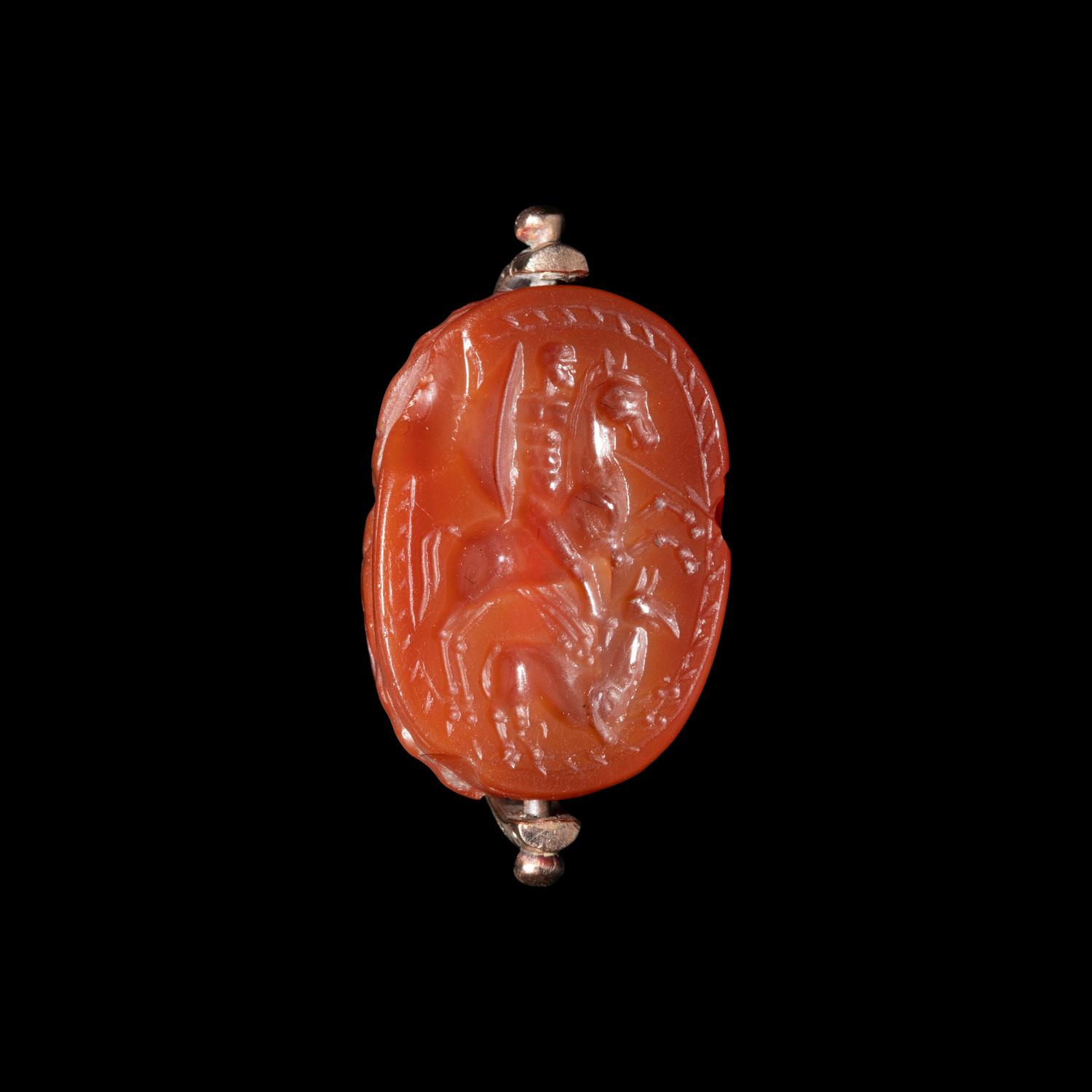 An Etruscan Carnelian Scarab with Warrior on Horseback and a Griffin — Set in a 19th Century gold swivel fob
