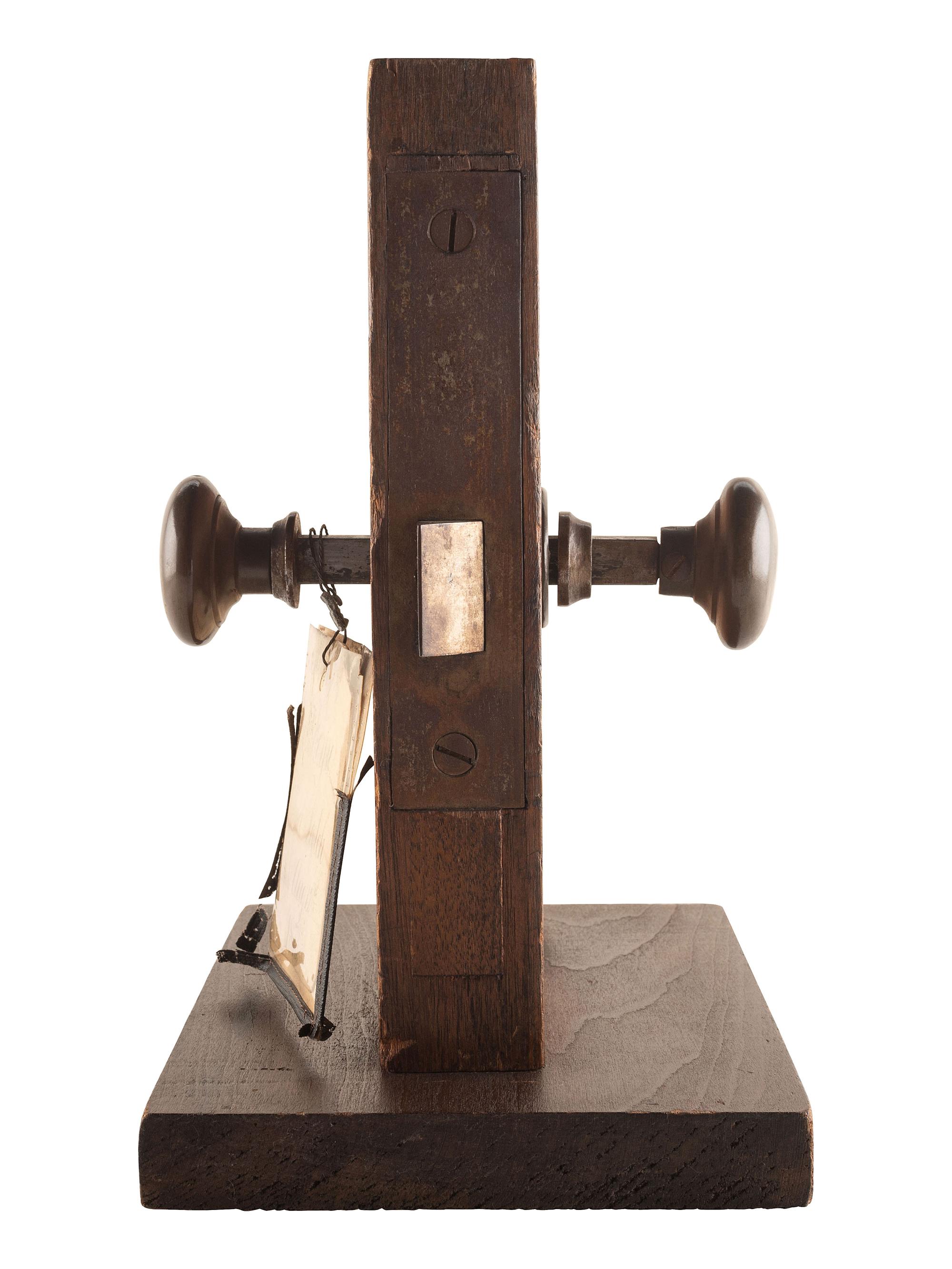 [SCIENCE & TECHNOLOGY]. A. Heyse patent model for a "Knob-Latch" with original tags. [Terre Haute, IN], 1873.