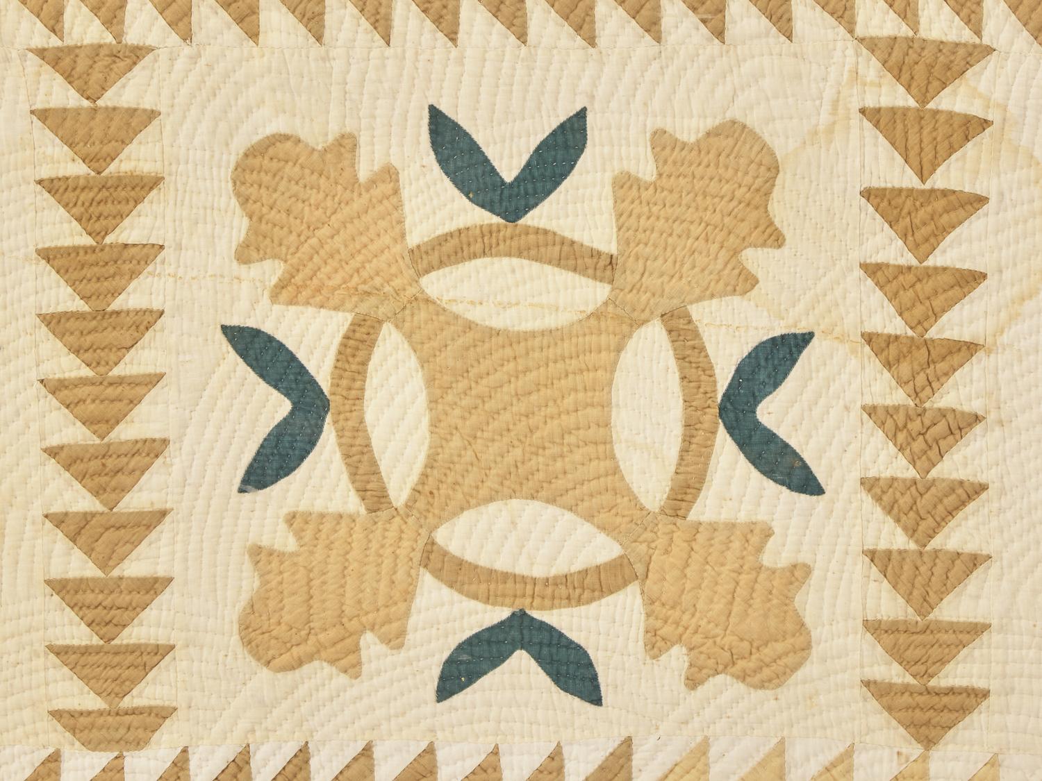 A Green and Tan Cotton Applique "Oak Leaf" Quilt