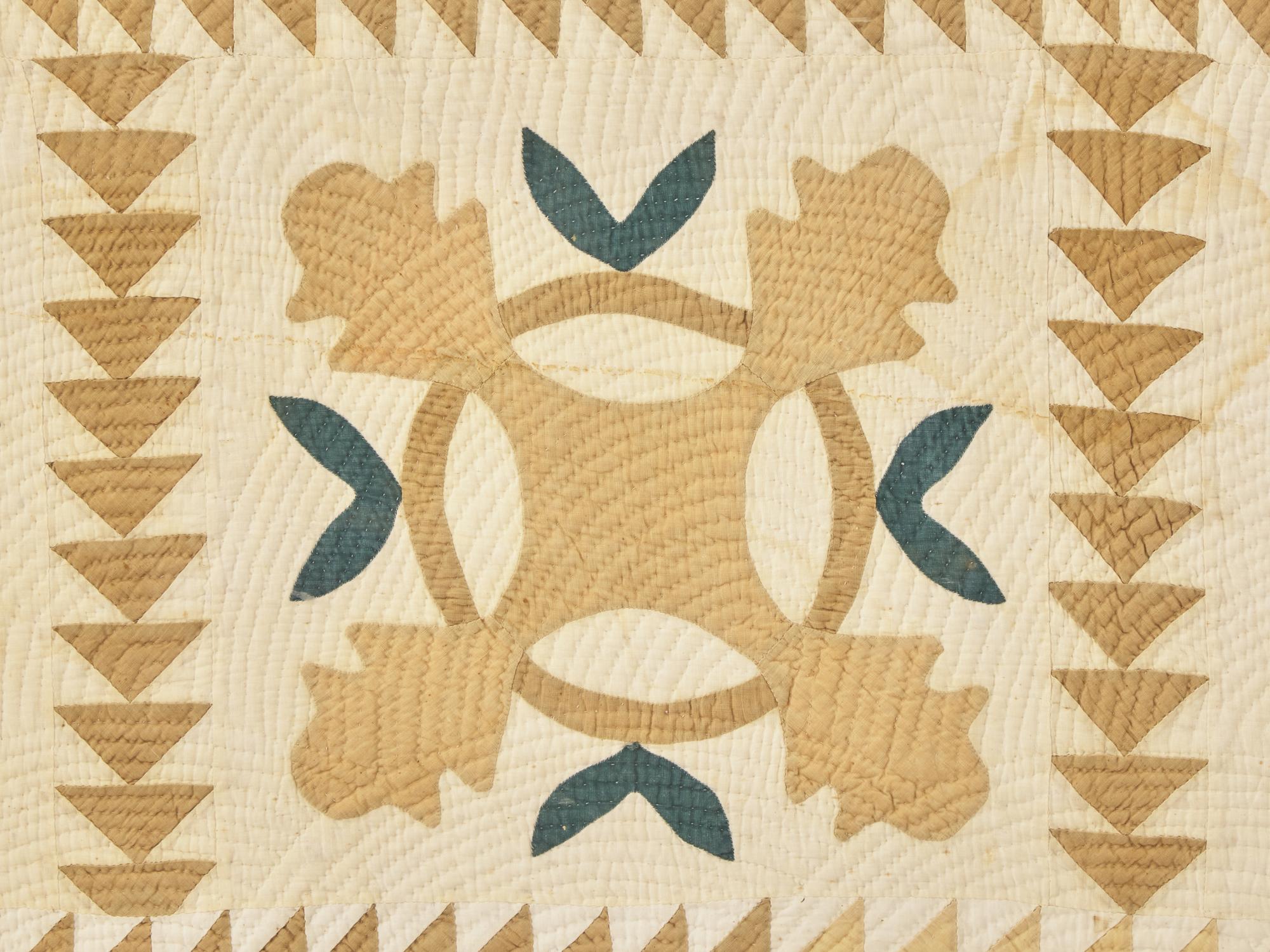 A Green and Tan Cotton Applique "Oak Leaf" Quilt