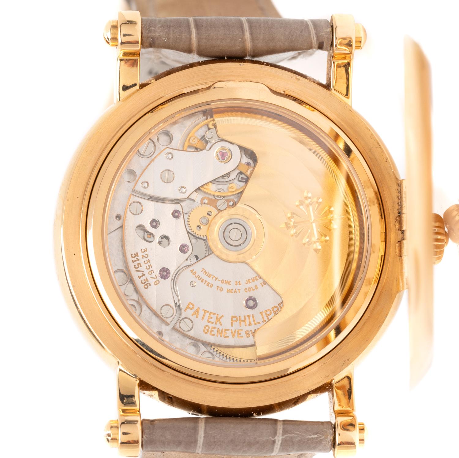 PATEK PHILIPPE, REF. 5059R 18K ROSE GOLD OFFICER'S CASE PERPETUAL CALENDAR, MOONPHASE WATCH, BOX & PAPERS
