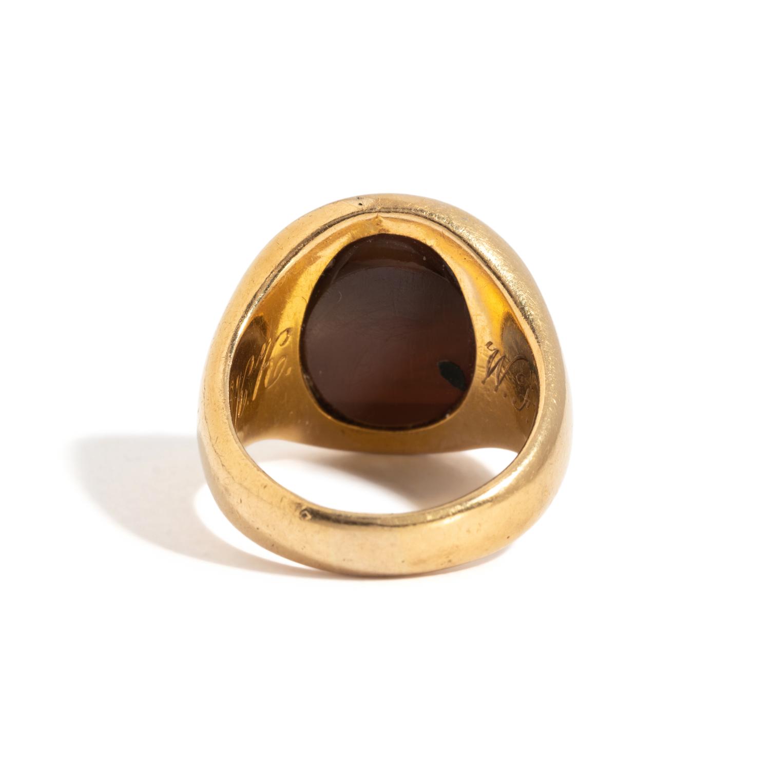 A Roman Carnelian Ring Stone with a Satyr Mixing Wine — Set in a gold ring