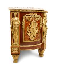 A Louis XVI Style Gilt Bronze Mounted Marquetry Commode
