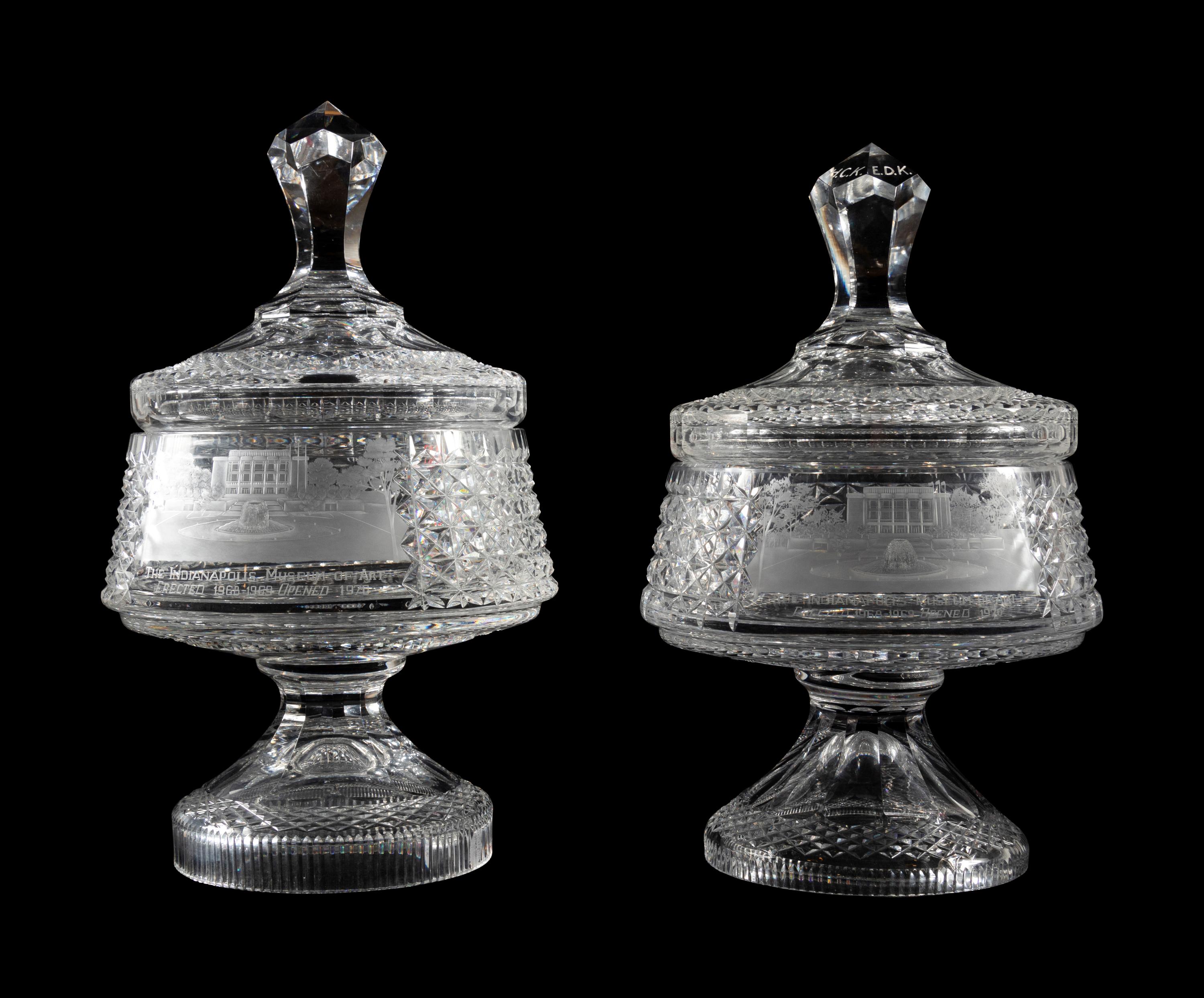 A Near Pair of Cut and Etched Glass Commemorative Covered Urns